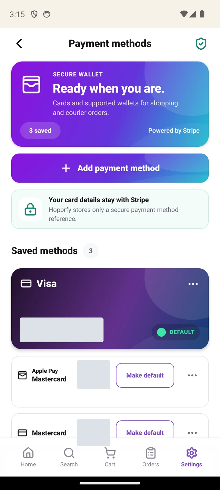 Saved payment methods with Add payment method and default selection; card identifiers redacted